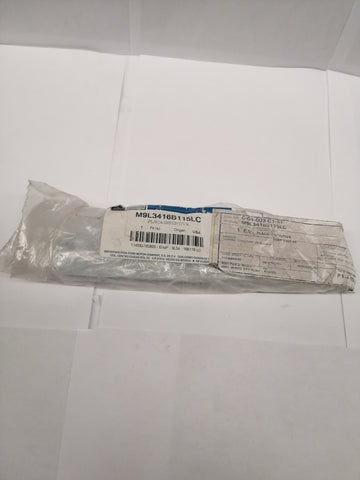 PLACA DISTINTIVA (M9L34-16B115-LC)
